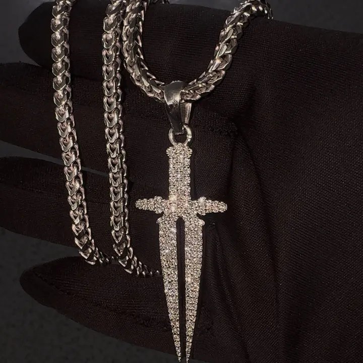 Iced-out dagger pendant on a franco chain by Goldlinx Jewelry