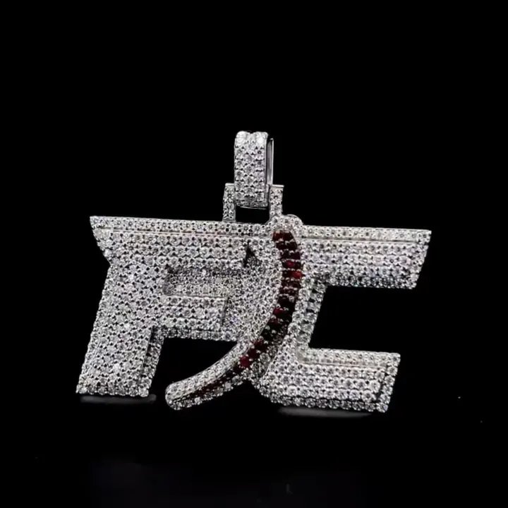 Custom iced-out FC initials pendant with red stone accent by Goldlinx Jewelry